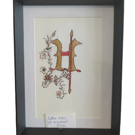 Lettre H en or minéral sur papier de haute qualité