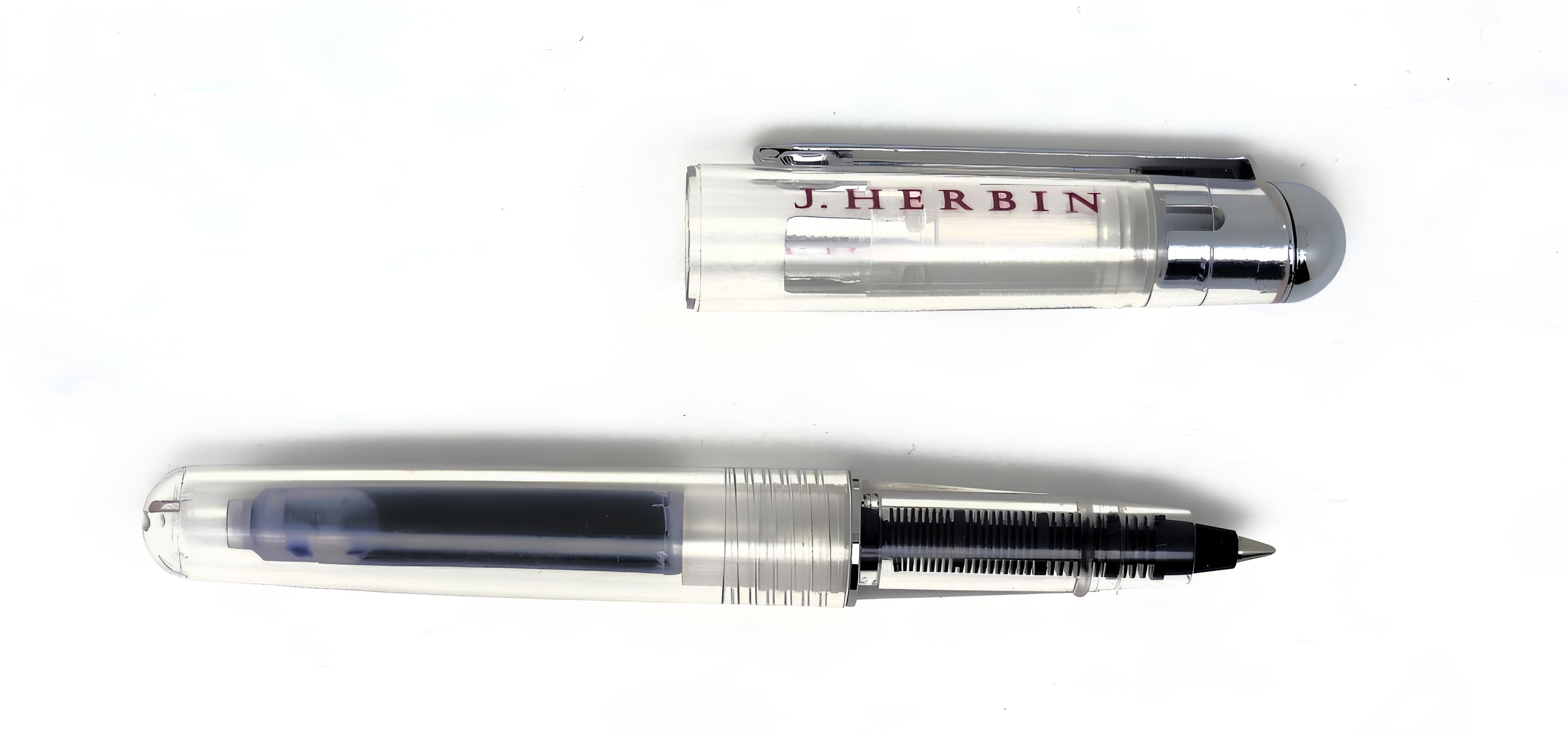 Ref: 0002268-4 Roller Herbin transparent avec une cartouche d'encre